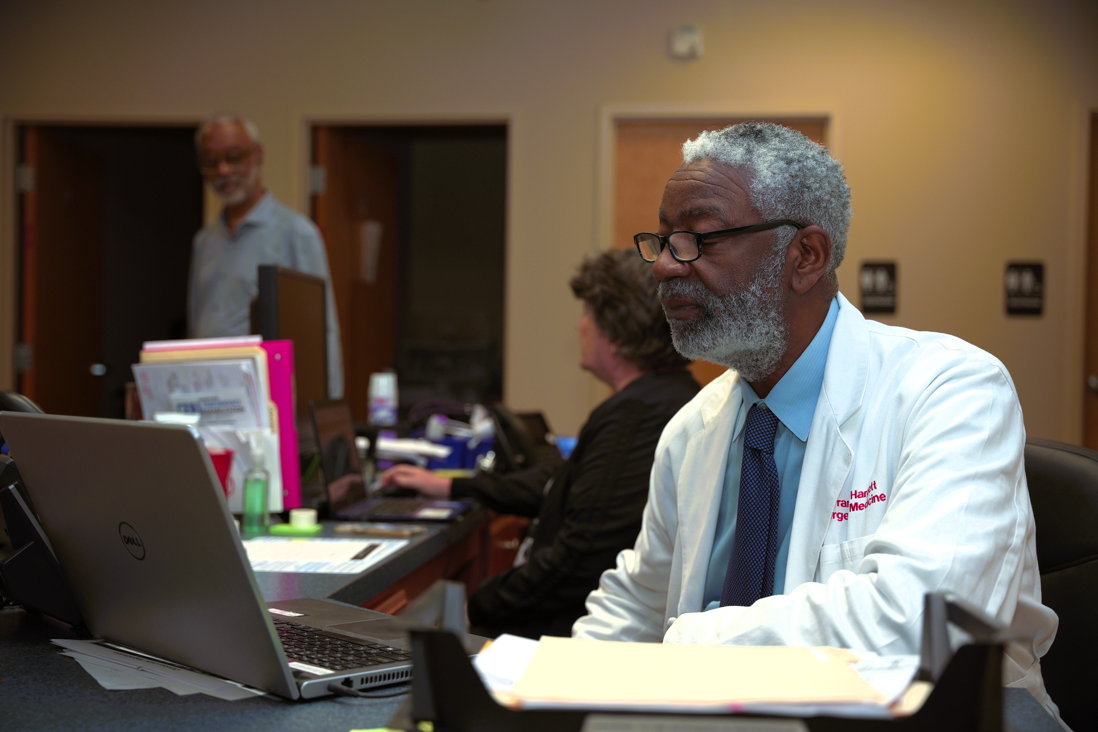 Doctor working at computer