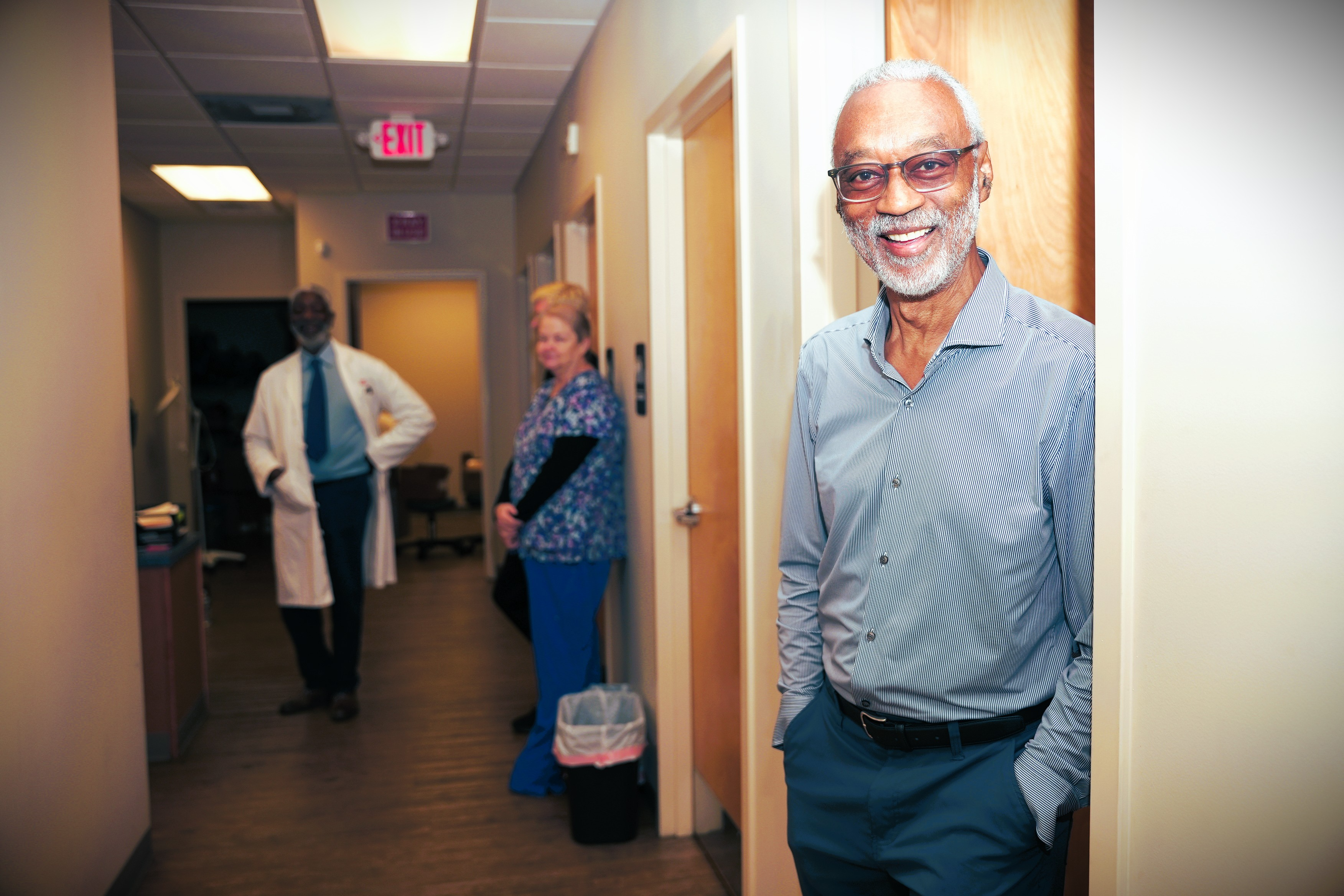 Friendly doctor in hallway